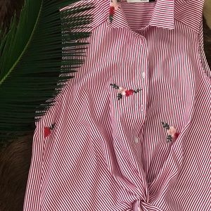 Striped blouse with embroidered details.